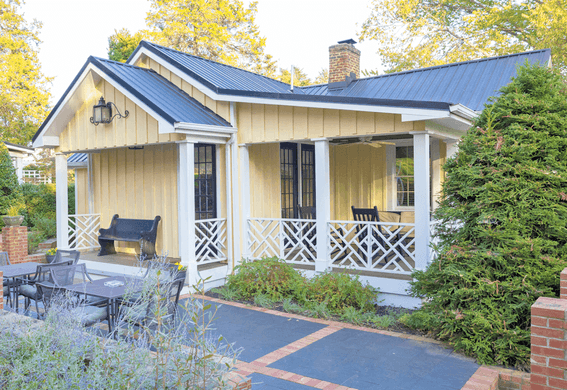 Charming cottage with a covered porch and outdoor seating in Inn at Willow Grove