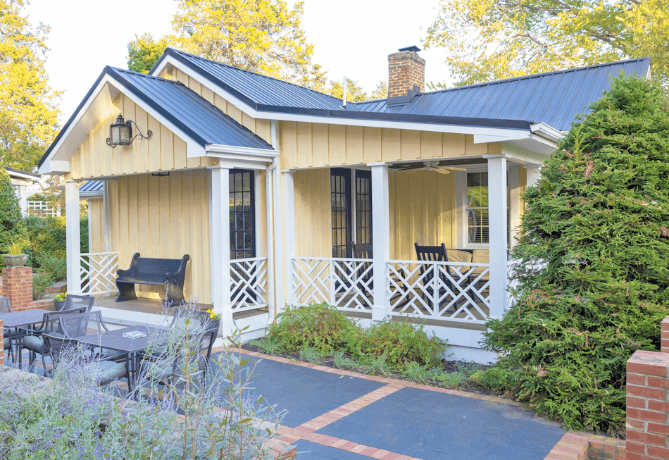 Charming cottage with a covered porch and outdoor seating in Inn at Willow Grove