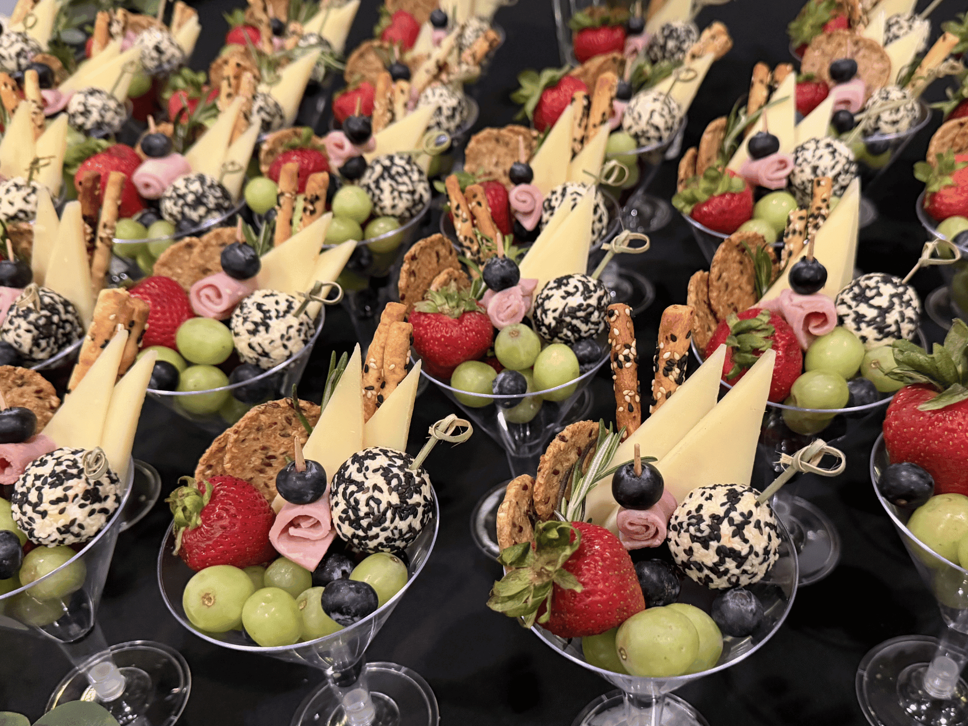 Close-up view of catering appetizers with fresh fruit and cheese skewers arranged in Convention Centre at Rodd Grand Yarmouth