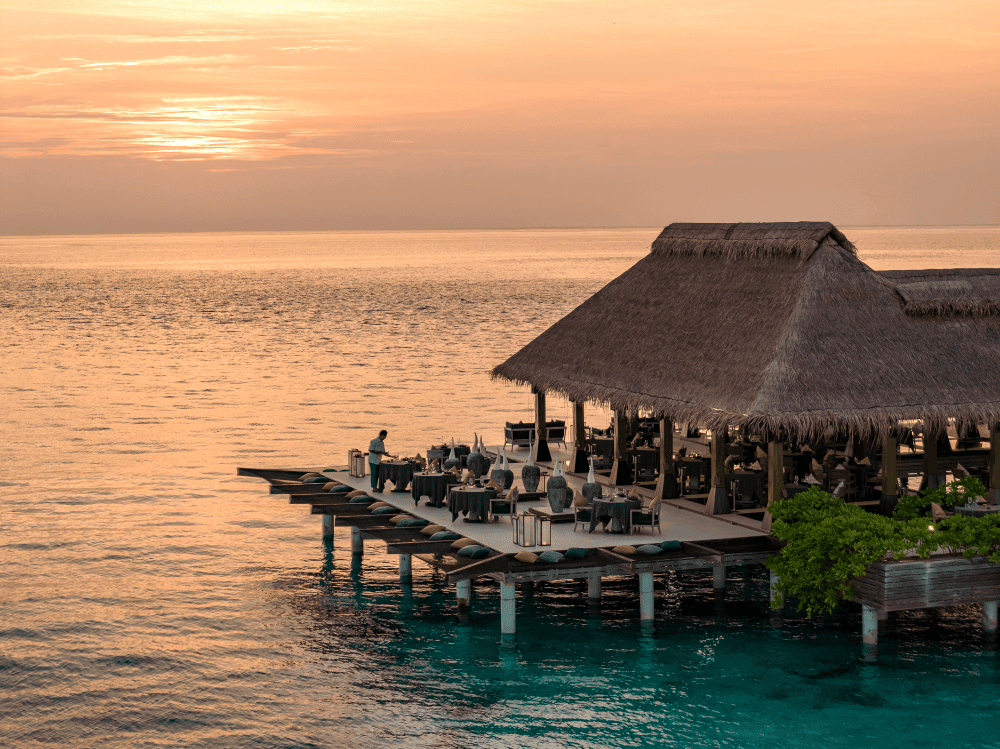 Grand Park Kodhipparu Maldives Firedoor Fine dining overwater restaurant with Sunset