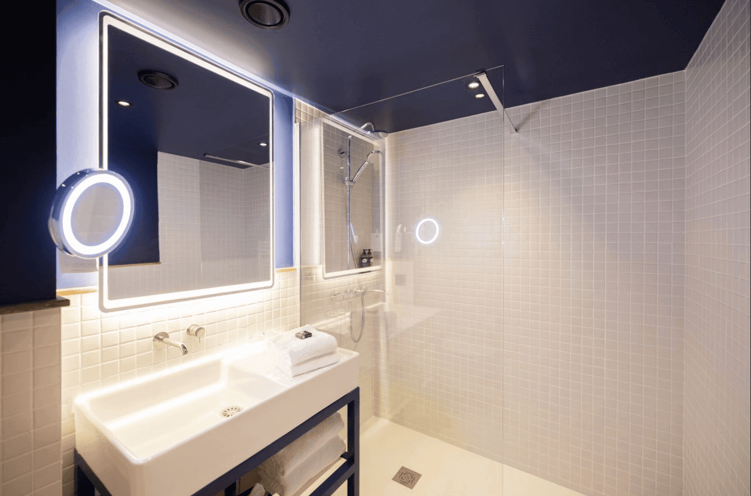 Bathroom shower & vanity in Cosmik at Kopster Hotel Paris Ouest Colombes
