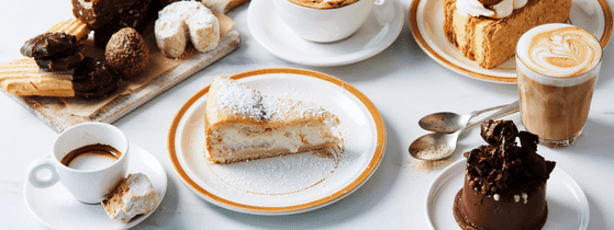 Attractive spread of desserts and coffee, perfect for a sweet treat at Corner Cafe in Novotel Sydney
