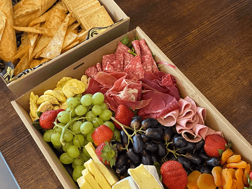 Cheese and cold meats served in boxes at Bacar Pullman Sydney Olympic Park