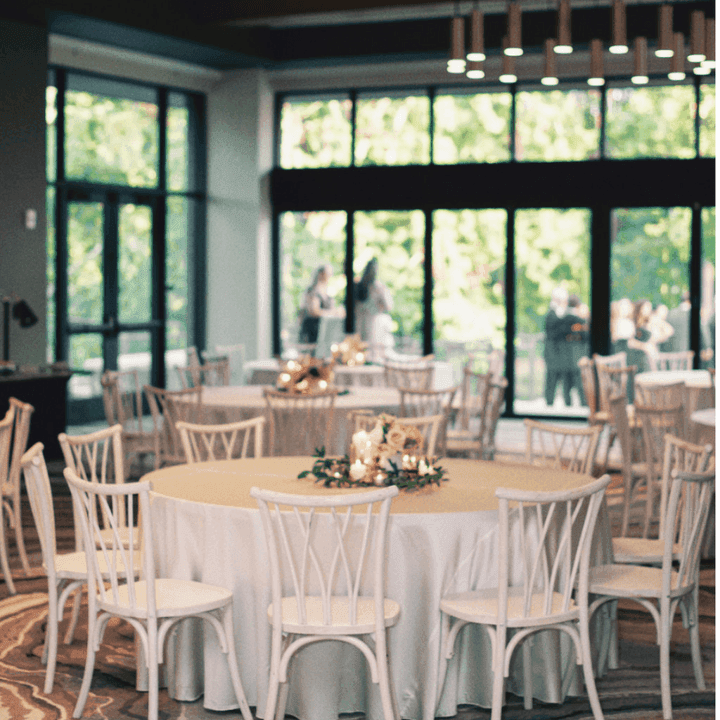 Shots of set wedding guest tables with simplistic design