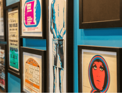 Artifacts hanging on wall in the lobby lounge area at The Verb Hotel