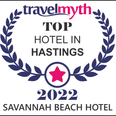 Travelmyth 2022 award badge for Top Hotel in Hastings with a pink star logo used at Savannah Beach Hotel