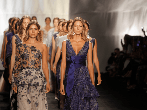 Women walking down runway