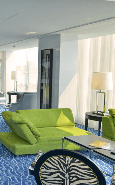 Cozy couch by the lounge area in Baía Bar at Hotel Presidente Luanda