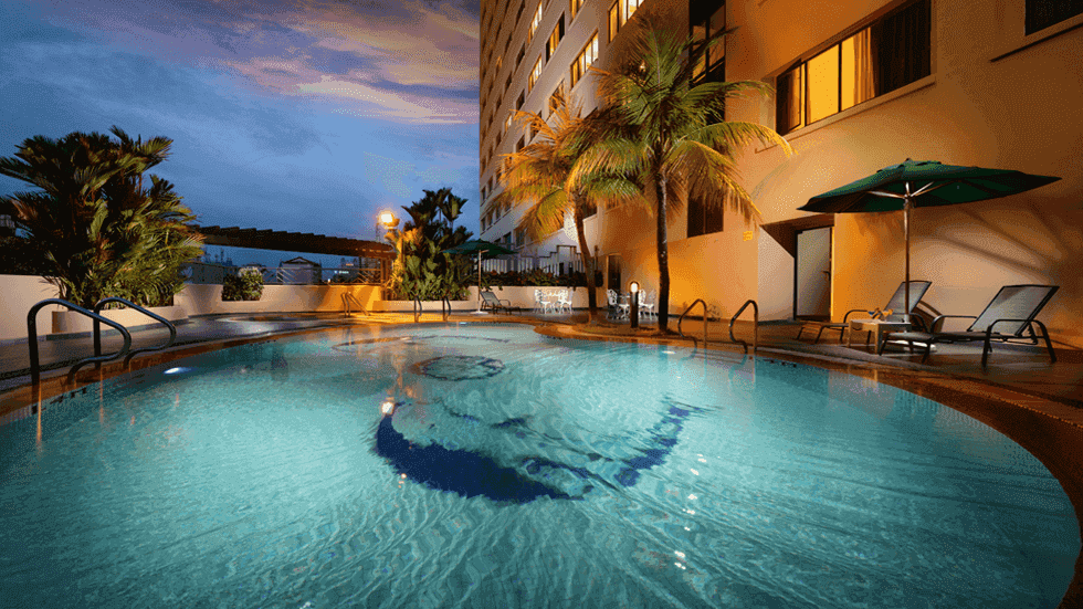 Exterior of outdoor pool & hotel in the night at Sunway Hotel Georgetown