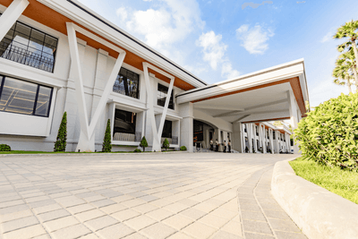 Exterior view of the hotel entrance and motor lobby at Amora Hotel