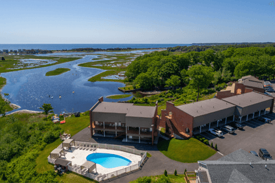 Aerial view of Ogunquit River Inn with the pool and river