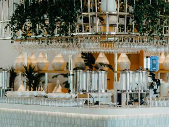 Bar counter with wine glasses in CineScope Restaurant at Paramount Hotel Midtown