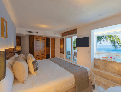 Honeymoon Suite Ocean View with a king bed at Buenaventura Grand Hotel and Spa