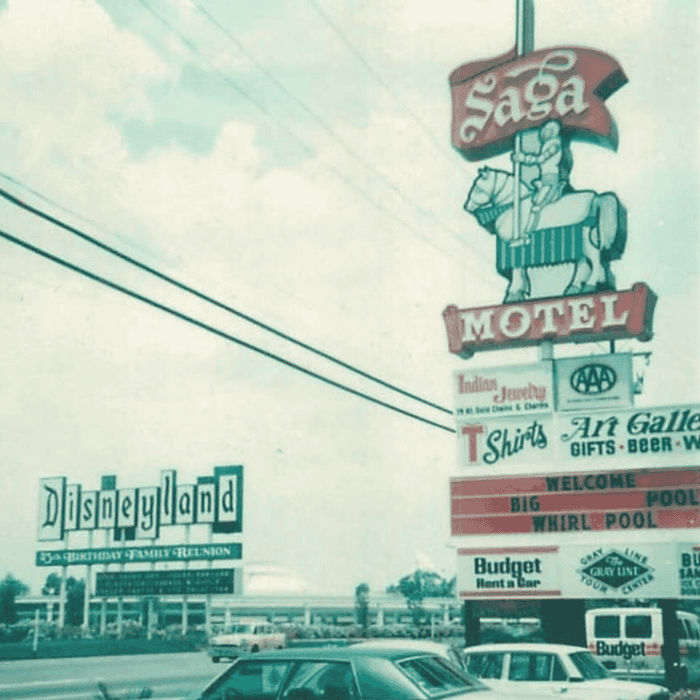Vintage image of a Saga Motel sign near Disneyland with cars on the road at Grand Legacy at The Park Anaheim