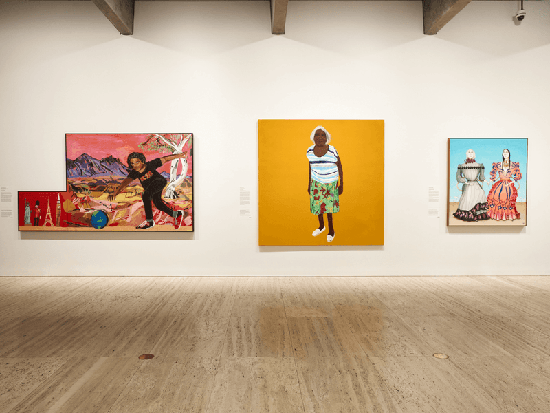 Three framed artworks displayed on a white wall in an exhibition space of Archibald 2026.