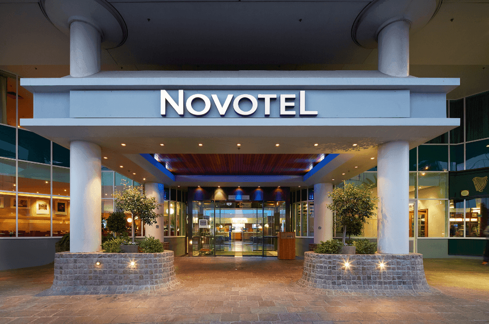 Novotel Suites Logo At Hotel Building In Munich Stock Photo - Download  Image Now - Advertisement, Apartment, Architecture - iStock
