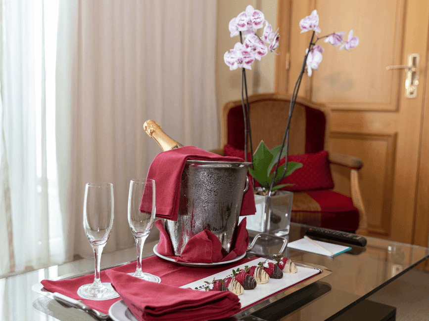 Champagne & chocolate strawberries served on a table at Hotel Cascais Miragem Health & Spa