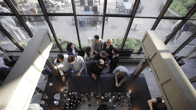 Overhead view of people in the bar at Mont Gabriel Resort & Spa