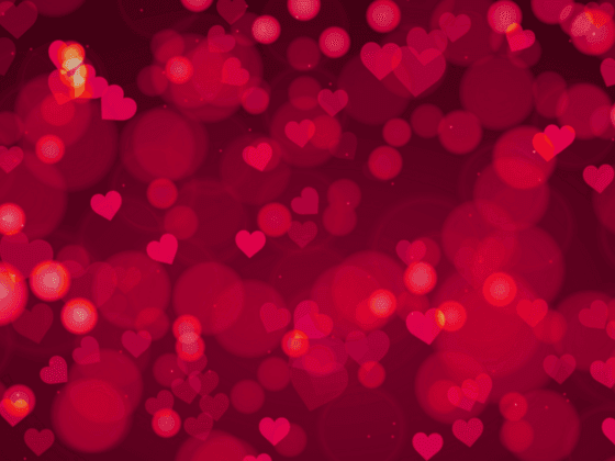 Coeurs rouges sur fond sombre pour le BRUNCH DE SAINT-VALENTIN.