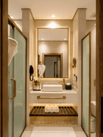 Vanity under mirror between glass doors in Deluxe Room at Naviti by Warwick Jeddah, featuring a peaceful boutique stay