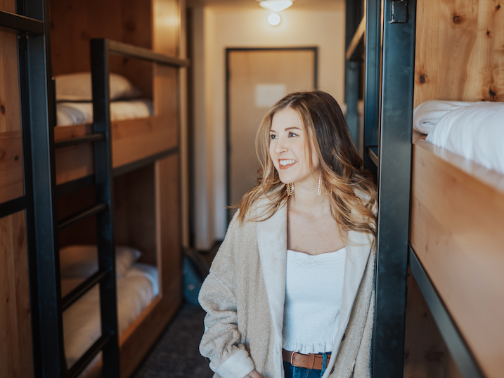 Closeup of a girl smiling in the room at Kinship Landing Hotel