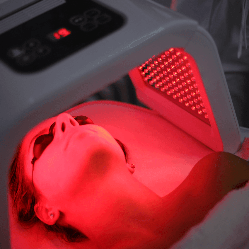 Lady undergoing red light therapy with a protective eyewear at Hotel Eldorado