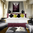 King bed in Studio Deluxe Room at Rome Luxury Suites