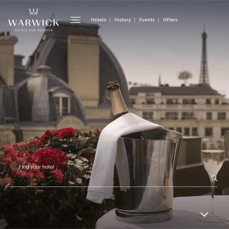 Champagne bottle with two glasses served at Roc e Fiori