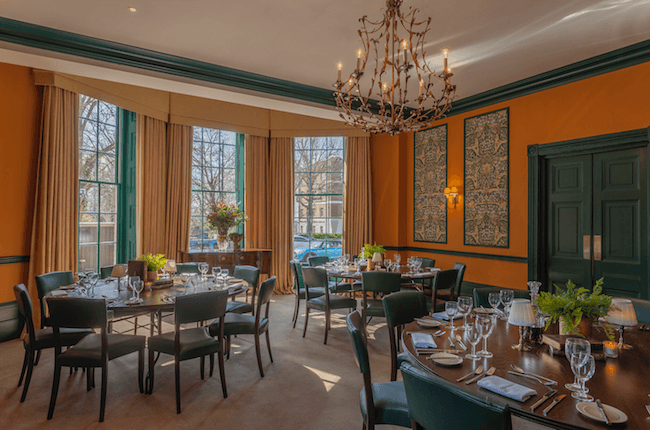 Interior view of a dining area at Richmond Hill Hotel