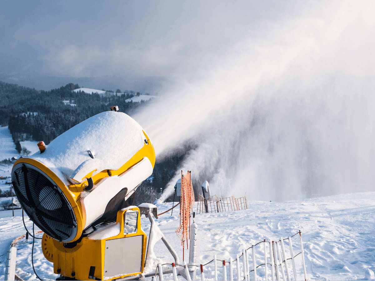 Snowmaking by an equipment near Blackcomb Springs Suites