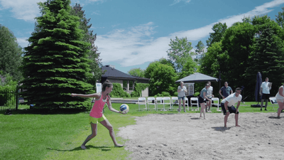 People playing volleyball at Hotel Mont Gabriel Resort & Spa