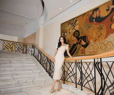 Girl posing for a photo on the staircase at Hanoi Daewoo Hotel