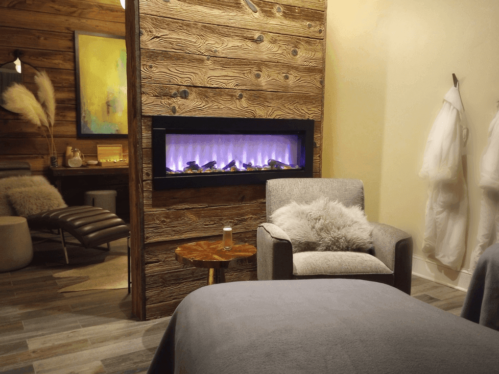 Cozy room with fire place and comfy chair, in the Inn at Willow Grove