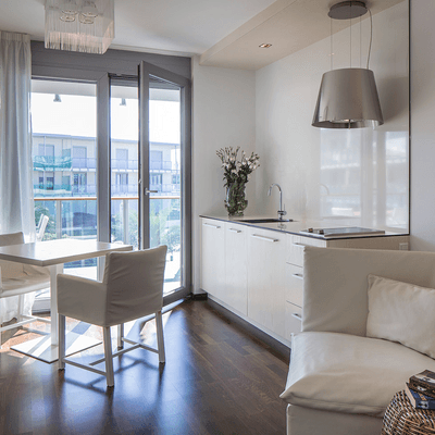 Apartment A Kitchenette & dining table at Falkensteiner Hotels