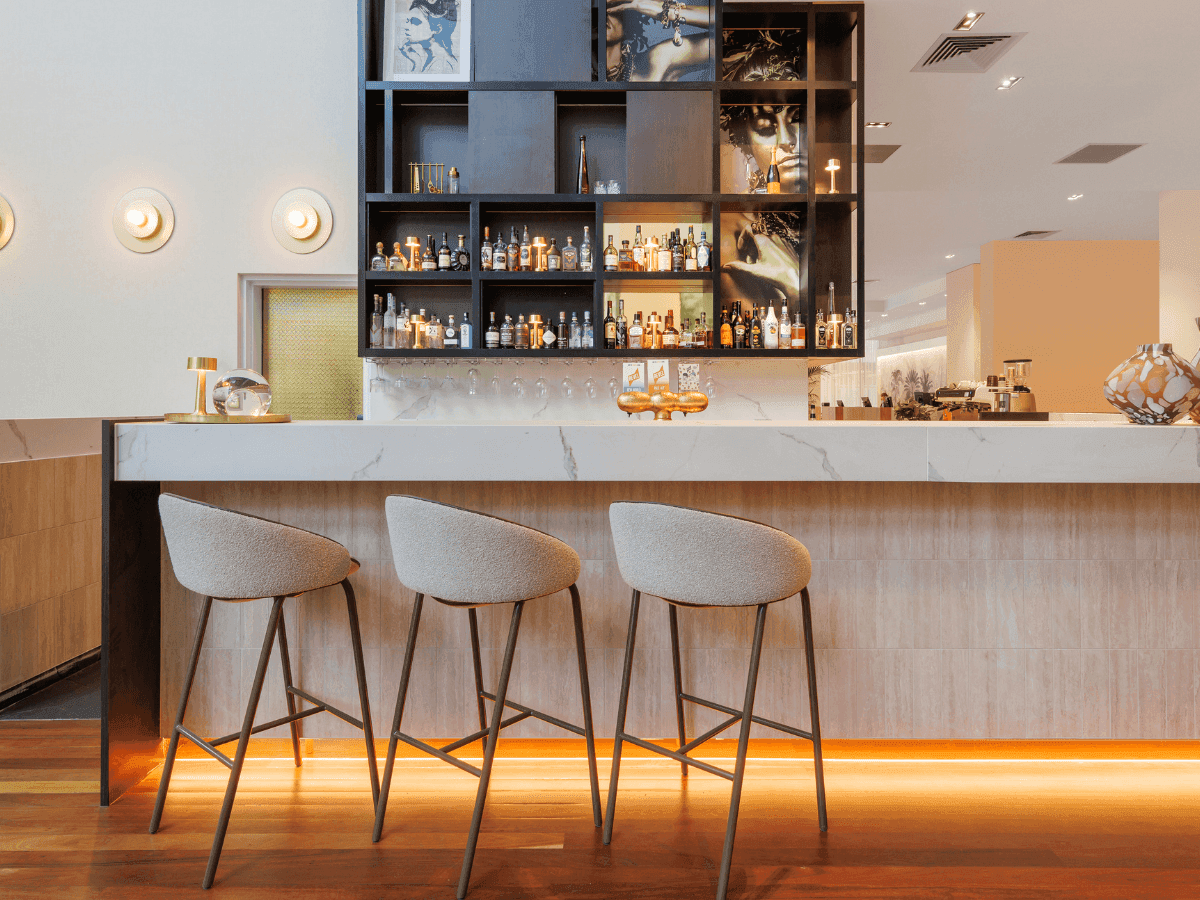 Three bar chairs at the Lobby Bar at Amora Hotel Brisbane