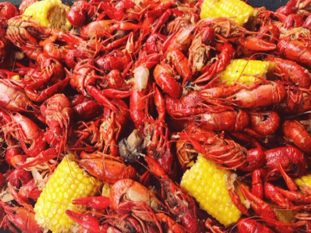 Crawfish and corn served at a shop near La Galerie Hotel