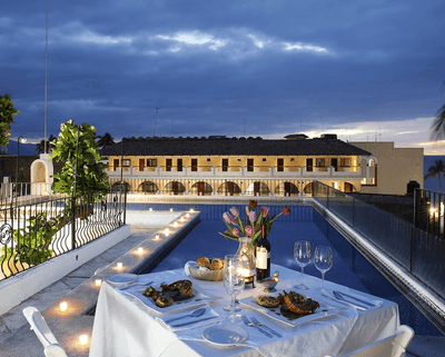 Dining table with outdoor pool, Casa Dona Susana