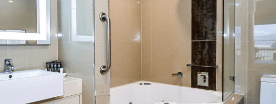 A bathtub in Spa Suite at Novotel Barossa Valley