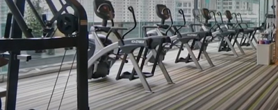 A gym with exercise equipment at VE Hotel & Residence