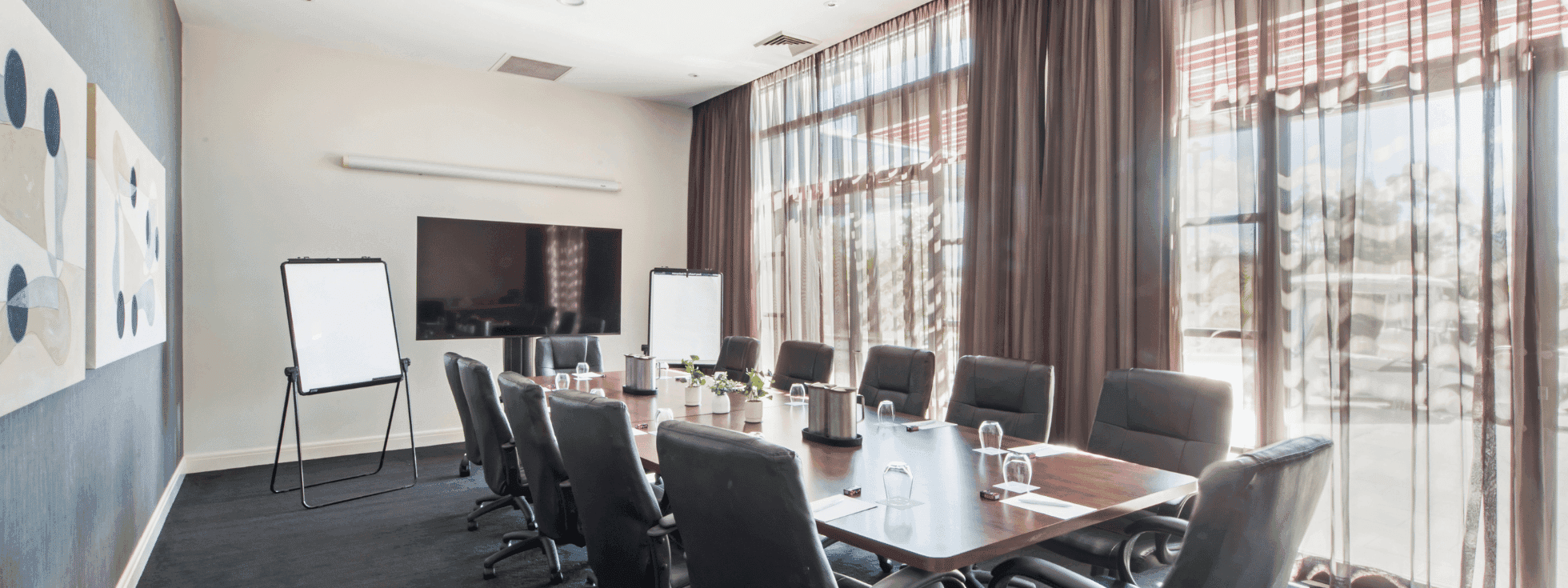 Central Coast sleek and professional space equipped for productive meetings and strategic discussions.