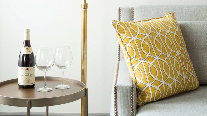 Wine by the sofa in Grand Suite at Warwick San Francisco