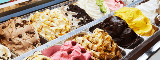 Vibrant display case showcasing assorted gelato flavors, a tempting dessert at Gelatissimo in Novotel Sydney