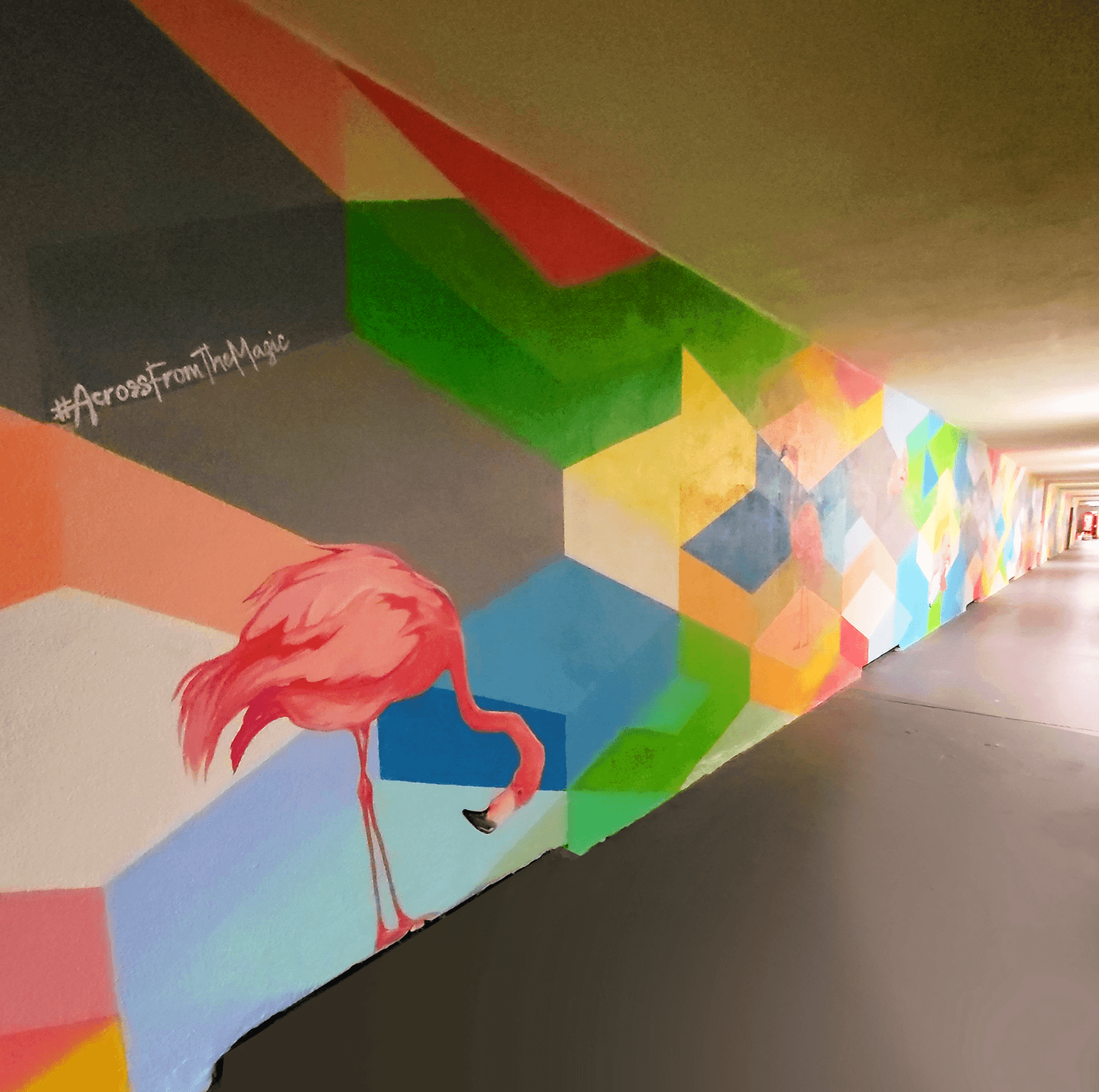 Painted mural of flamingo in long hallway at The Anaheim Hotel