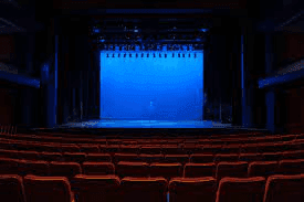 Seats in a theater with blue screen at Nesuto Parramatta Apartment Hotel