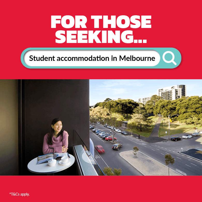 Woman relaxing at table on balcony overlooking busy street and park in Melbourne at Student Living D1.