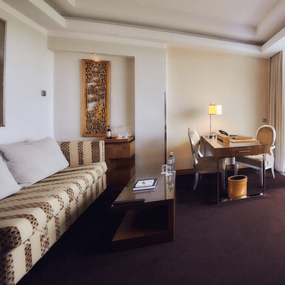 Junior Suite Deluxe work desk & lounge at Falkensteiner Hotels