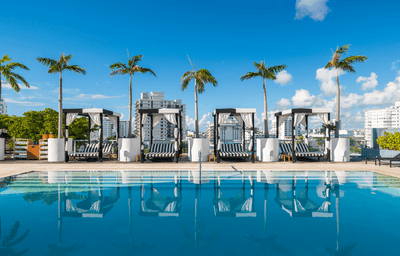 Rooftop pool deck with pool bed area at Boulan South Beach