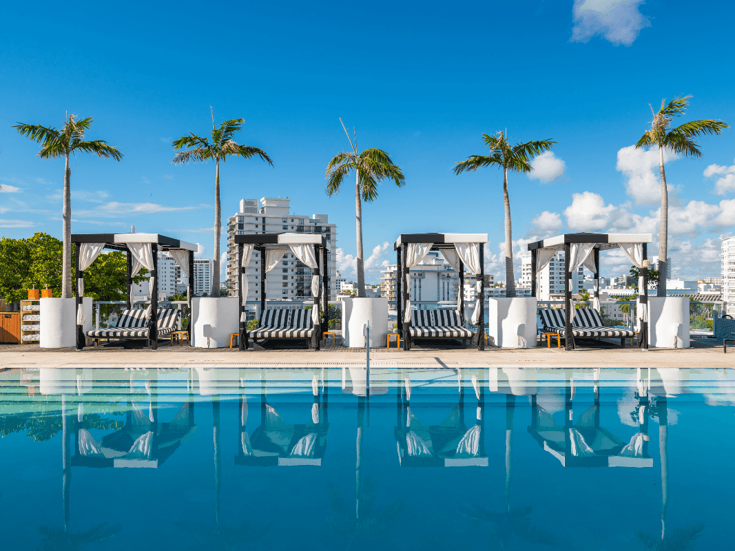 Rooftop pool deck with pool bed area at Boulan South Beach