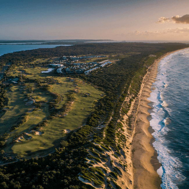 Aerial view of the golf course with the sea near Pullman Magenta Shores