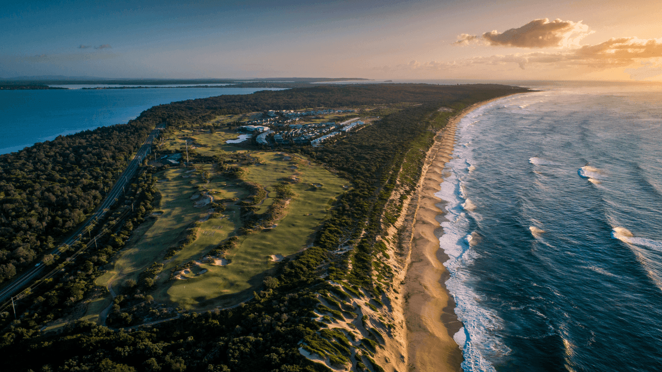 Aerial view of the golf course with the sea near Pullman Magenta Shores